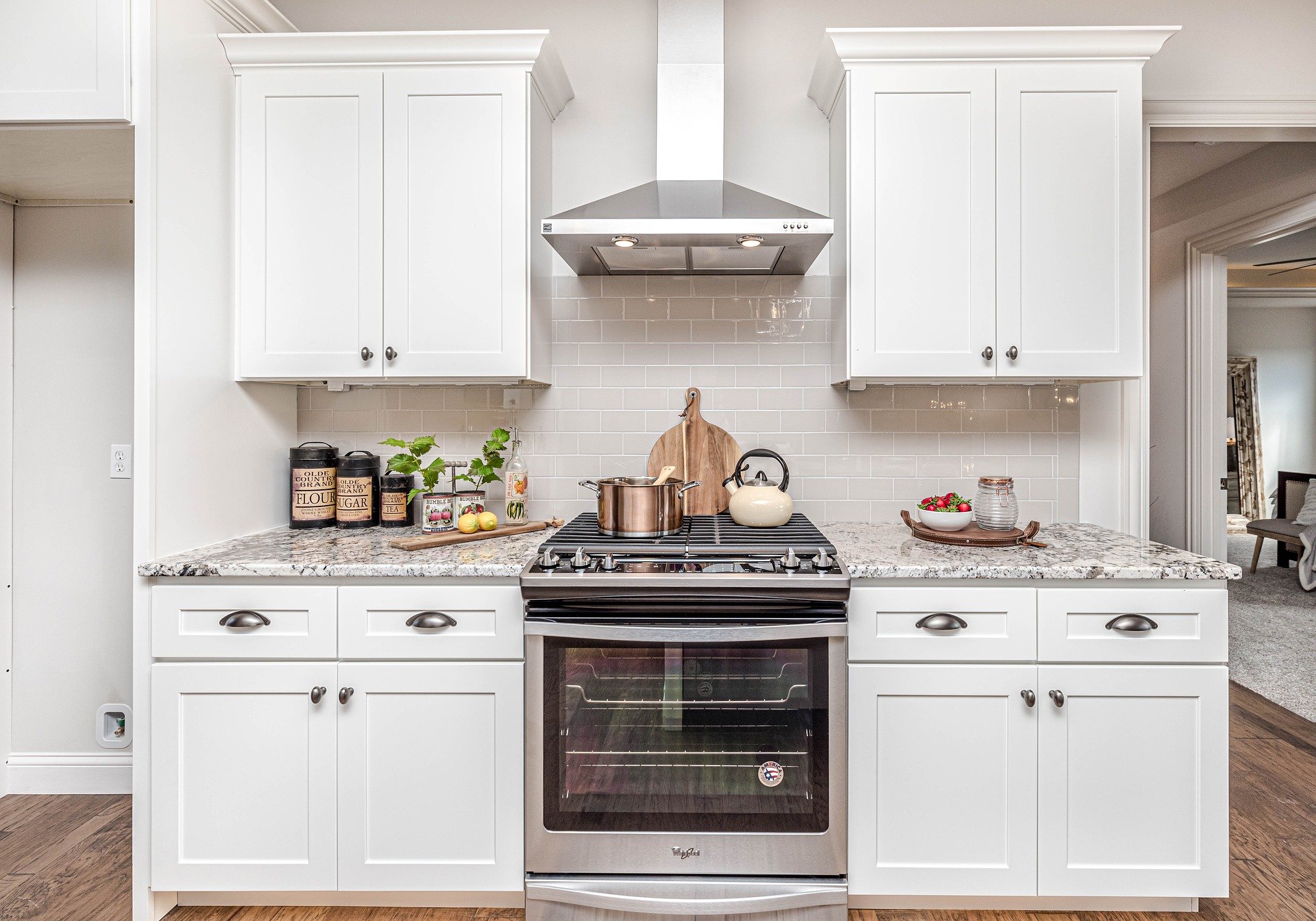 Modernised kitchen with white cupboards